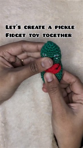 Crochet with meera on Instagram: "Just a little pickle to keep my hands busy 🥒💚 This crochet pickle fidget is squishy, silly, and oddly satisfying to squeeze. Who knew stress relief could be this cute? #crochetersofinstagram #fidgettoy #crochet #amigurumi #pickle fidgettoy handmade emotionalsupportpickle cute stressrelief smallbusiness"