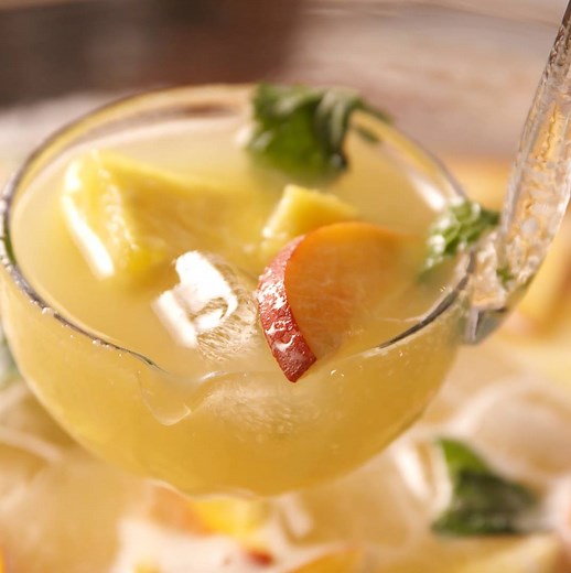 Prosecco Punch will knock out your whole crew. Full recipe: http://dlsh.it/mAugVv1 | Delish