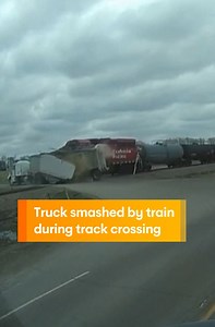 Truck Smashed by Train During Track Crossing