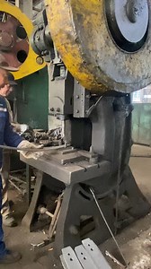 The process of drilling holes for steel leaf springs #machine #factory #process #technology #tech #manufacturer #producer #production #manufacturing #tech #springs | TIM inside the factory