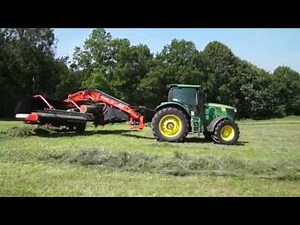 John Deere 6190R mit Kuhn Bandschwader Merge Maxx 900