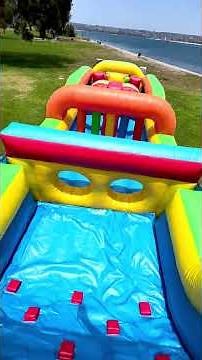 Rainbow 56' Inflatable Obstacle Course with Dual Lane Slide - San Diego Bounce - Inflatable Rental