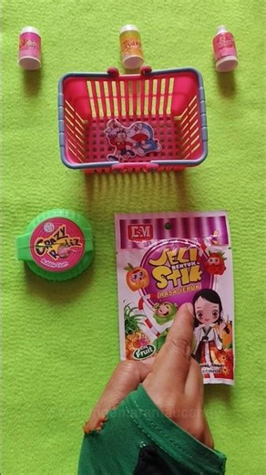 Green bubble gum vs purple jelly stick candy in basket#shorts