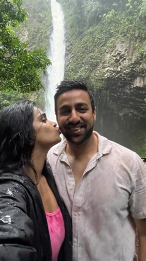Dharani Aruhn 🇺🇸🇮🇳 TRAVEL | LIFE on Instagram: "📍Fortuna Waterfalls, 🇨🇷 There’s a reason La Fortuna Waterfall is on every “Top 10 Waterfalls in Costa Rica” list — the moment you hear that roar through the rainforest, you’ll know why 🤍 Just 10 minutes from La Fortuna town, tickets are around $18 per adult, and you’ll hike 500 steps down to reach the base. The trail is lush, the water is cold and clear, and the climb back up… well, she’ll humble you but in the best way. Go early, carry wat