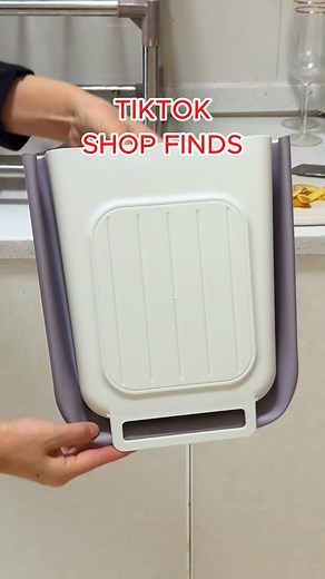Just upgraded my kitchen with this foldable mini trash bin and wow,...