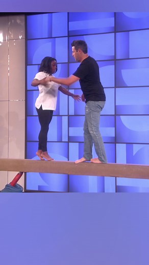 Learn How to Beam with Simone Biles and Andy