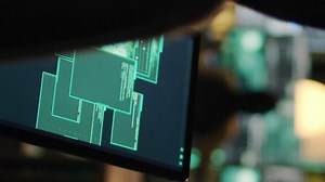 Vertical video: Cyber criminals using knowledge of computer systems to access sensitive information illegally, making online threats and asking ransom. Male thief hacking security network at night