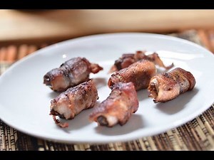 Dates stuffed with almonds and wrapped in bacon