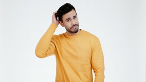 Face, confused and man in studio scratching head | Premium Stock Video Footage