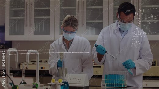 Two lab techs dispensing and pipetting, device sending overlays over bench, processing lab samples