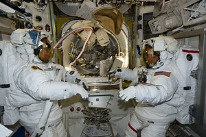 Astronauts Mike Barratt and Tracy C. Dyson are pictured in the Quest airlock