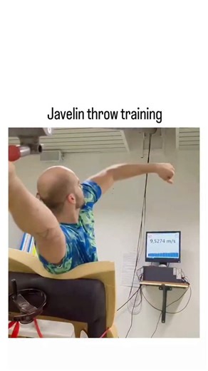 buzz__decode on Instagram: "The video features a javelin athlete practicing release mechanics on a seated simulator with a ceiling-mounted cable and velocity monitor, achieving arm speeds up to 10.23 m/s to isolate throwing power without run-up risks. This velocity-based training method, rooted in progressive drills like those from MF Athletics, enhances explosive arm action and technique; peer-reviewed studies in the Journal of Strength and Conditioning Research link higher release velocities (