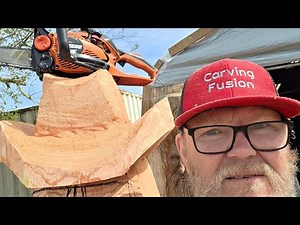 Chainsaw carving -Cowboy spirit face.