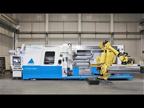 Flow forming machine for rotationally symmetrical hollow bodies