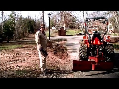 How to use the road blade to cut a ditch line