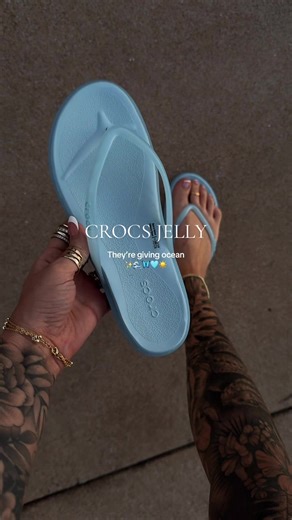 The new blue jelly @crocs flipflops are EVERYTHING 🦋🩵 #ocean#beach#crocs#flipflops#crocssandals