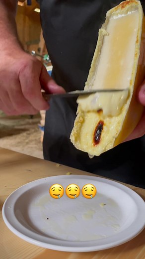 Delicious Raclette Cheese Melting Video