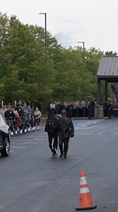 A riderless horse, boots reversed, is escorted after the hearse of one of the slain police officers whose joint funeral was being held at Living Word Community Church. Detective Sergeant Cody Becker, Detective Mark Baker and Detective Isaiah Emenheiser were slain last week in a violent ambush while serving an arrest warrant for a domestic-related stalking charges. | PennLive.com
