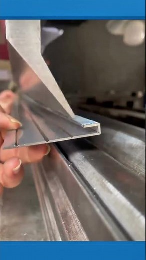 Metal plate bending and shaping process for precise forms. #MetalWork #FabricationProcess