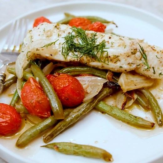 NEW! Halibut and veggies, tossed in a bright Mediterranean sauce! RECIPE: https://www.themediterraneandish.com/one-pan-mediterranean-baked-halibut-recipe-with-vegetables/ | The Mediterranean Dish
