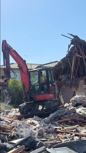 Ledge Climbing with a Small Excavator
