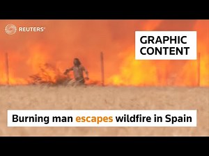 WARNING: GRAPHIC CONTENT - Burning man escapes wildfire in Spain