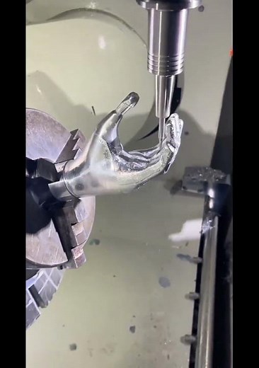 The 5-axis motion enables undercutting, curved surfaces, and fine details without repositioning