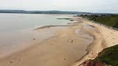 Exmouth at low tide, drone view of the beach and cliffs