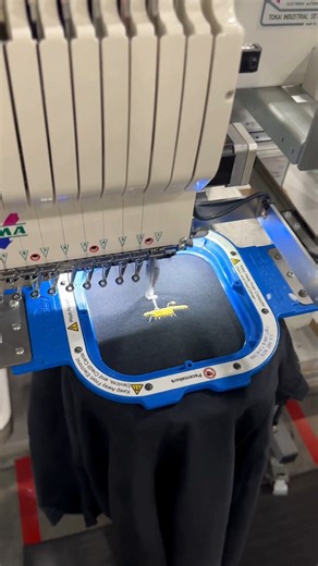 3K views · 32 reactions | As requested, here is the process of fulfilling your custom embroidered t-shirt, @dindindotshop  It’s no secret that we do cool things, but one of the coolest things we do is support small businesses across the world. And we always enjoy a look behind the scenes!  #printfulstitch #madewithprintful #smallbiz #custommerch | Printful | Facebook