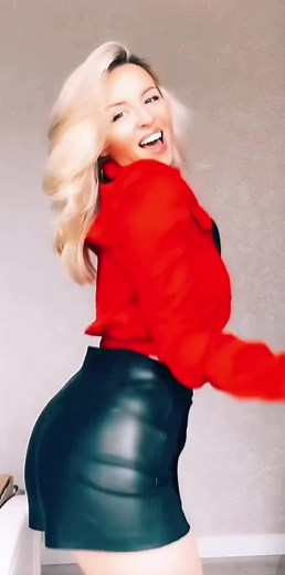 Blonde Hair Performing Dance in Red Cropped Jacket