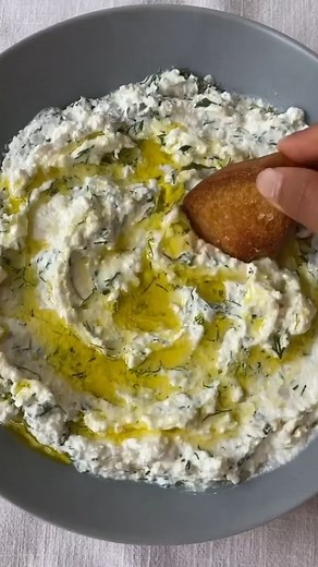 This spoonable ricotta dip is simple but effective—ricotta, lots of chopped herbs, freshly grated lemon zest, olive oil and plenty of salt and pepper. Recipe: https://food52.com/recipes/78081-ricotta-spoonable | Food52