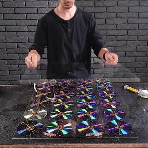 Drilling Into 50 CD Discs! Thanks for watching! Please be aware that this video is for entertainment purposes only and techniques shown should not be attempted at home! | Awesome