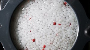 clip-1031801384-plastic-granules-on-extruder-making-plastics-extrusion