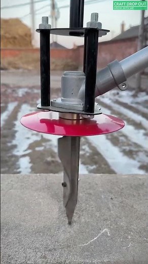 Drill-powered soil auger for quick garden work 🌱⚡