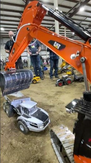 HUGE RC excavator makes the dump truck look small