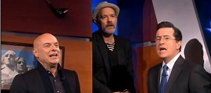 Watch Michael Stipe, Brian Eno, and Stephen Colbert Sing "Lean On Me"