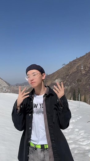 Exploring Snowy Mountains: Unique Hand Gestures