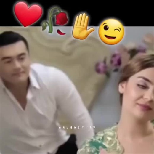 Intimate Moments in a Dimly Lit Bedroom Setting