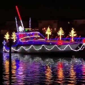This guy has the holiday spirit at the Christmas boat parade in Freeport, New York, last night. | Yachting Magazine