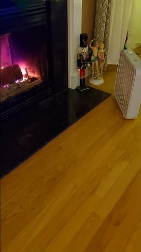 Box fan blowing heat off fireplace glass helps with heating bills. #youtubeshorts #tipsandtricks