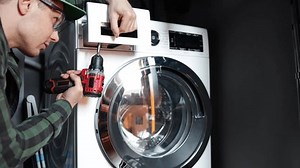 Foreman Uniform Repairing Washing Machine Using Stock Footage Video (100% Royalty-free) 3489096811 | Shutterstock