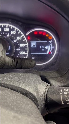 2015 Nissan Versa oil life reset