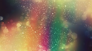 White particles moving on multicolor background - Free Stock Video