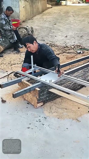 Worker Cutting Wood with a Saw Machine