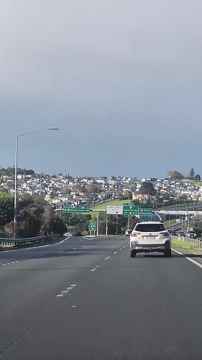 3.8K views · 30 reactions | Hillside houses stealing the spotlight on our drive.  #showcasingnewzealand #newzealand #auckland #houses | Purely New Zealand | Facebook
