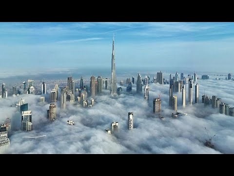 World's tallest building above the clouds, Burj Khalifa & Dubai skyline
