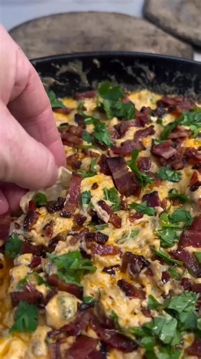 Paul Wickey on Instagram: "Easy & Cheesy Jalapeno Popper Dip for the Big Game. This next-level dip is easy to make, and even easier to take down with your Game Day crew! You have to try this! Here’s how to make it Ingredients: 8-10 Jalapenos 6-10 Strips of Bacon 16 oz Cream Cheese (2 Blocks) 16 oz Block Cheddar Cheese 1 lb Cooked Chorizo 1-2 TBS Pit Boss Southwestern BBQ Rub 2-3 TBS Hot Honey 1/2 Cup Sour Cream 1 TBS Minced Garlic 1/2 Cup Parmesan Cheese 1. Directions: First, cook your bacon acc