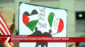 Denver anti-ICE protesters take to the streets of downtown