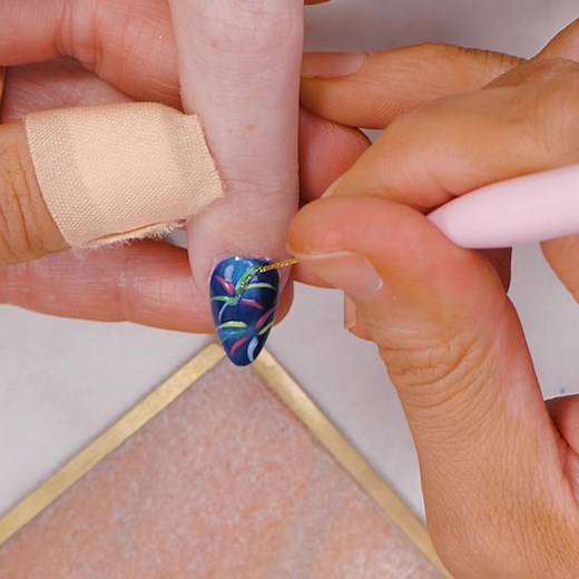 For Bonfire Night Sarah created this Firework nail art using Glow in the Dark & Cat Eyes gel polish 🎆 | Naio Nails UK