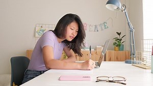 Asian Female College Student Doing Homework Writing on Paper at Home. Chinese Teen Girl Studying with Laptop. 4k Video Stock Footage - Video of education, computer: 318926382